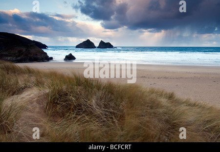 After the rain on Holywell beach soon after sunrise North Cornwall Stock Photo