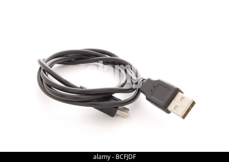 Coiled USB download cable on white background Stock Photo