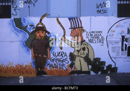 Mural / graffiti protesting against USA involvement in Latin America, World Bank and International Monetary Fund, Iquique, Chile Stock Photo