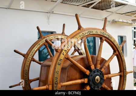 Twp wooden steering wheels of a sailing ship Stock Photo