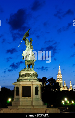 VIENNA, Austria — The equestrian statue of Prince Eugene of Savoy stands proudly in front of the Hofburg Palace. The bronze monument, depicting the military commander on horseback, contrasts dramatically against the ornate Baroque façade of the former imperial residence in Vienna's historic center. Stock Photo