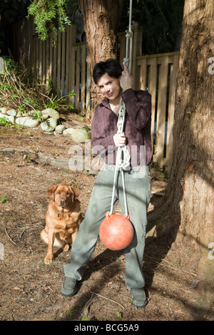 Latino man and labrador dog Stock Photo