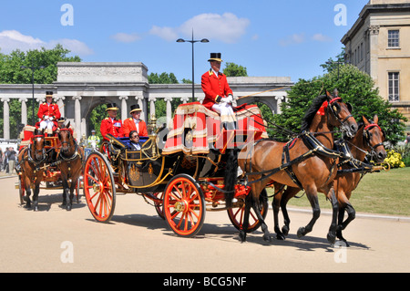 Hyde Park Corner London two horse drawn open carriages Stock Photo