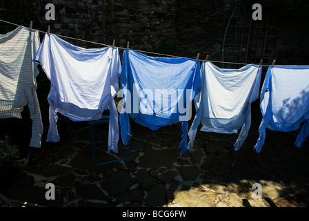 Mens shirts hanging on washing line Stock Photo