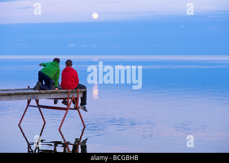 Wooden pier overlooking Puck Bay early evening Hel Peninsula Baltic Sea Poland Stock Photo