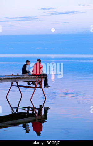 Wooden pier overlooking Puck Bay early evening Hel Peninsula Baltic Sea Poland Stock Photo