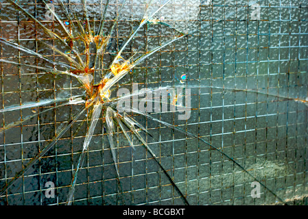 smashed glass in shop door Stock Photo