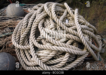 A pile of nylon rope or line used to tie ships to their mooring or dock. Stock Photo