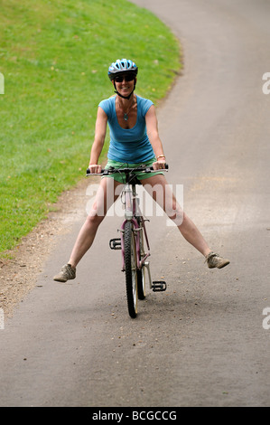 Rear view portrait of a naked female cyclist at the London Naked Bike