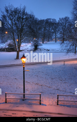 Winter evening scene with lamp-post Stock Photo