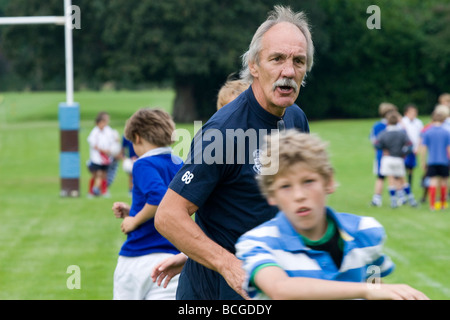 England rugby captain 1977 &1979 Roger Uttley coaches at Suffolk prep school Brandeston Hall Stock Photo