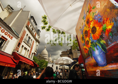 paintings at Place du Tertre Montmartre, with view of Sacre Coeur, Paris France Stock Photo