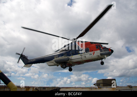 A Super Puma Helicopter operating in the North Sea Stock Photo