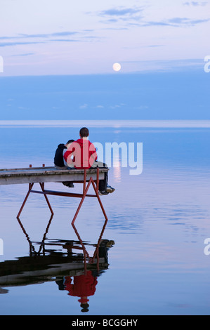 Wooden pier overlooking Puck Bay early evening Hel Peninsula Baltic Sea Poland Stock Photo