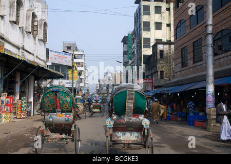 Rickshaws on the street in Dhaka Bangladesh Stock Photo