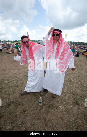 Fancy dress Arabs at Glastonbury Festival 2009 Somerset England Stock Photo