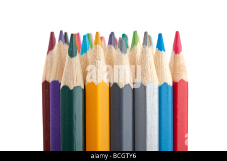 Assortment of coloured pencils isolated on white background Shallow depth of field Stock Photo