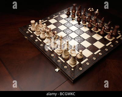Chessboard on a table Stock Photo