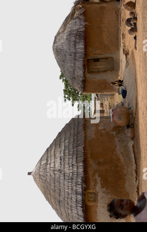 Mud hut homesteads in village in Tamale Ghana Africa Stock Photo