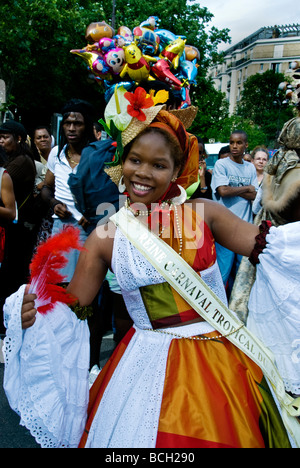 Paris France, Portrait Black Woman, Public Events 'Tropical Carnival' Parade 'Carnival Queen' Dancing on Street Costume French Festivals, fancy dress Stock Photo