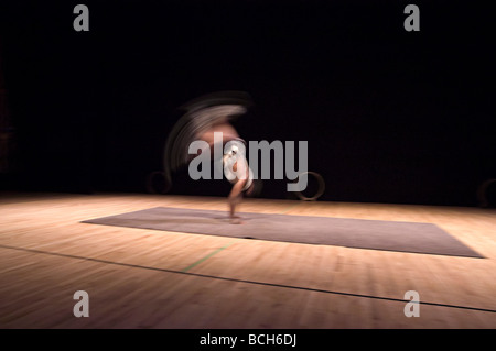 african acrobats performing on stage as part of a childrens entertainment show Stock Photo