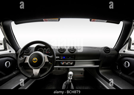 2009 Lotus Exige S260 in White - Dashboard, center console, gear shifter view Stock Photo