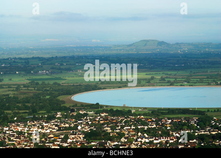 Looking across the North somerset Levels from Cheddar Gorge Cheddar reservoir can be seen Somerset England UK Stock Photo