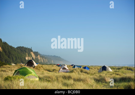 Prairie Creek Redwoods state park, California - Tents camping on dunes at Gold Bluffs Beach campground Stock Photo