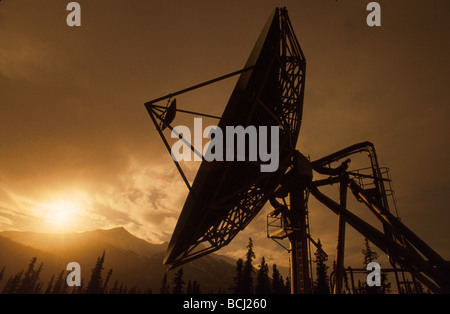 AK Southcentral Sunset GCI Sattelite Dish Eagle River Summer Scenic Mountains Trees Sky Stock Photo