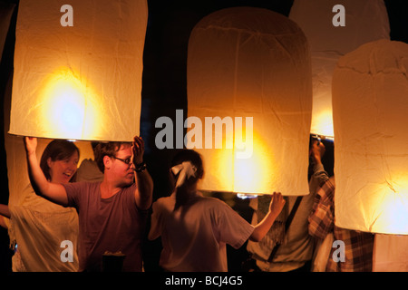Hot air balloons Loy Krathong festival Nawarat Bridge Chiang Mai Thailand Stock Photo