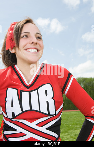Cheerleader smiling Stock Photo