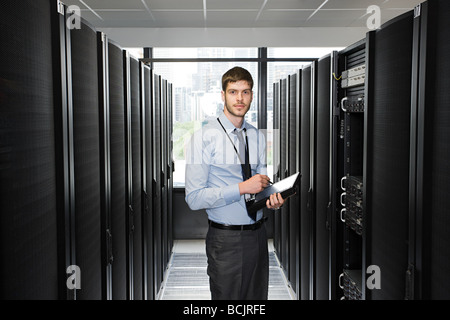 Computer technician working on a server Stock Photo