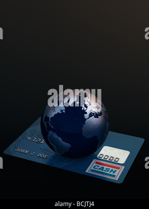 Globe on a credit card Stock Photo