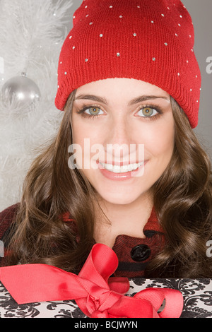 Smiling woman wearing a knit hat