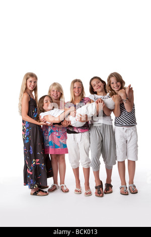 Six girls of 10 years old in a row Stock Photo