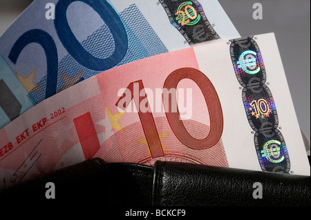 ten and twenty euro banknotes in wallet Stock Photo