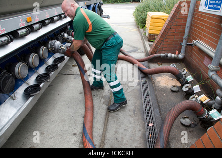 Petrol tanker delivery Tesco filling station Stock Photo