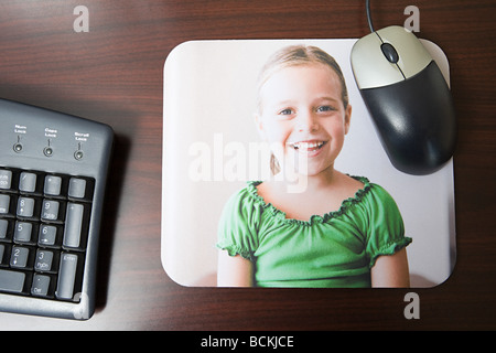 Personalised mousepad with photo of little girl on it Stock Photo