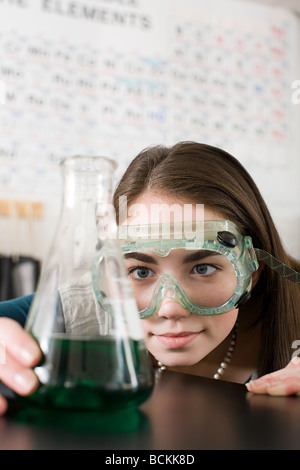Girl in science class Stock Photo