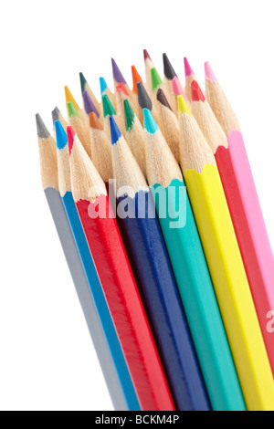 Assortment of coloured pencils isolated on white background Shallow depth of field Stock Photo