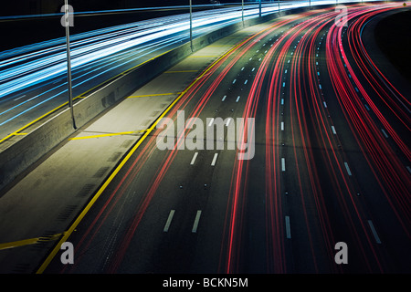 Automobile lights on highway Stock Photo