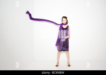 Woman with scarf in mid air Stock Photo