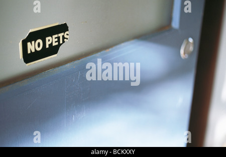 No Pets sign on door Stock Photo