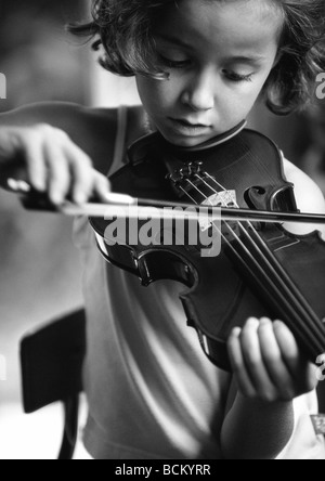 Girl playing violin Stock Photo