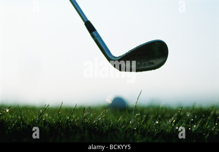 Golf club, golf ball in background Stock Photo