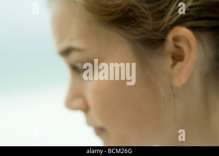Female in profile, cropped view, defocused Stock Photo