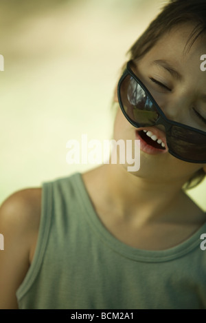 boy-kid-smiles-with-his-mouth-closed-closeup-of-a-child-mouth