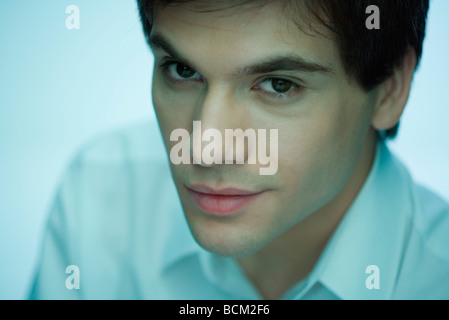 Young man smiling at camera, portrait Stock Photo