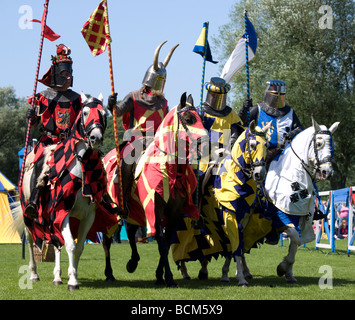 Four Knights preparing for the joust at a Medieval re-enactment event Stock Photo