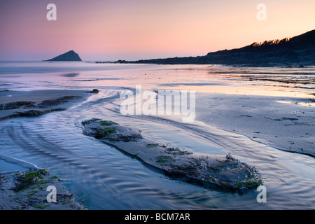 Wembury Bay and the Great Mewstone at sunset Wembury Devon England Spring April 2009 Stock Photo